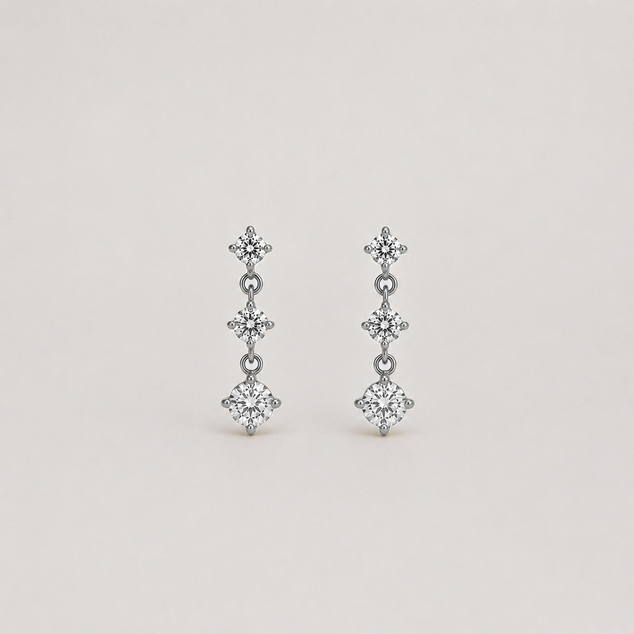 ORECCHINI TRIPLA LUCE
