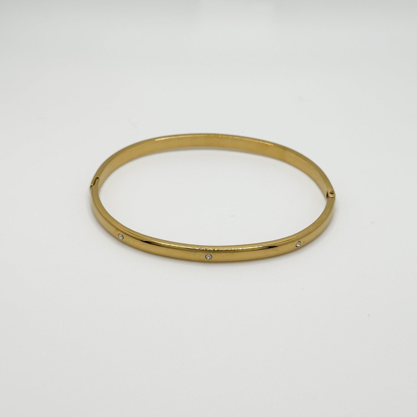 BRACCIALE RIGIDO ZIRCONI