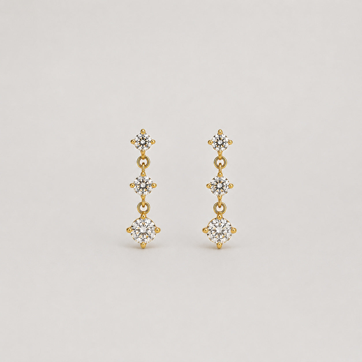 ORECCHINI TRIPLA LUCE